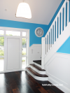 white stairs, white staircase, blue, bright blue, hallway, painted panels, paint ideas, paint trends